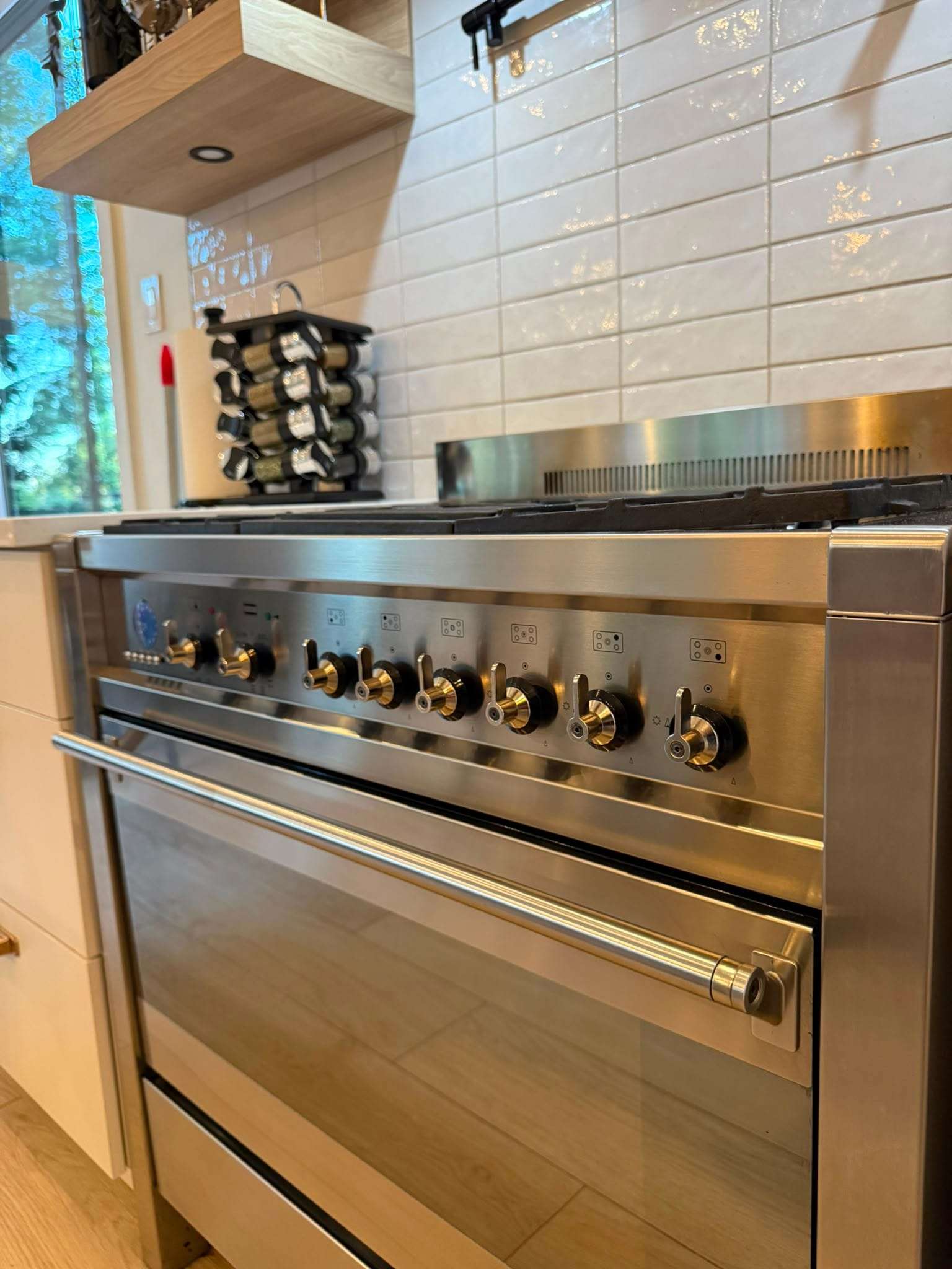 Detail of a degreased stainless steel range after a deep clean